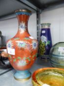 TWO MODERN ORIENTAL CLOISONNÉ VASES, one of ovoid form in red, the other of slender baluster form in