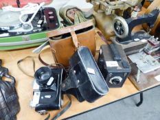 CONWAY BOX CAMERA, IN CASE; ZENIT - B SLR CAMERA, IN CASE; PAIR OF BINOCULARS, IN CASE AND A LEATHER