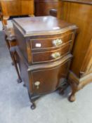 MAHOGANY BEDSIDE CUPBOARD WITH SERPENTINE FRONT, TWO SHORT DRAWERS OVER A CUPBOARD, ON CABRIOLE