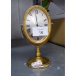 IMHOF GILT METAL CASED OVAL DRESSING TABLE CLOCK WITH 8 DAYS MOVEMENT