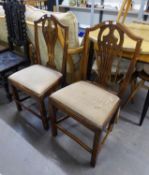 A PAIR OF ANTIQUE MAHOGANY DINING CHAIRS OF HEPPLEWHITE DESIGN