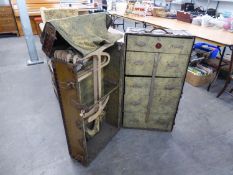 A FITTED STEAMER TRUNK OR CABIN WARDROBE, OPENING AND LIFT-UP TOP, ONE SIDE HAVING PULL-OUT WARDROBE