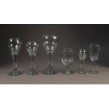 PART SET OF TEN BALUSTER STEMMED WINE GLASSES, each with double ogee bowl and plain foot, 8? (20.