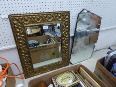 A RECTANGULAR BEVELLED EDGE WALL MIRROR, IN EMBOSSED BRASS FRAME AND A FRAMELESS WALL MIRROR (2)