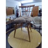 A SET OF THREE ERCOL STICKBACK KITCHEN CHAIRS AND AN ERCOL COMB BACK KITCHEN CHAIR (4)