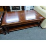 A LARGE OBLONG CHERRY WOOD COFFEE TABLE WITH UNDER TIER, WITH TWO END DRAWERS, RAISED ON STRAIGHT