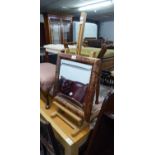 A SMALL SQUARE MIRROR IN GILT AND RED FRAME AND A WOODEN EASEL (2)