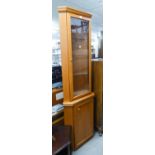 WILLIAM MORRIS FURNITURE, TEAK DOUBLE CORNER CUPBOARD, WITH GLAZED UPPER DOOR ENCLOSING THREE