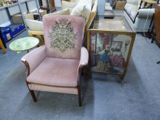 PARKER KNOLL FIRESIDE ARMCHAIR AND AN OAK GRATE SCREEN/COFFEE TABLE WITH GLAZED PICTORIAL TAPESTRY