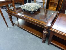 A REPRODUCTION MAHOGANY OBLONG COFFEE TABLE, WITH INSET GLASS TOP AND UNDER-TIER, RAISED ON TURNED