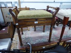 AN EDWARDIAN PIANO STOOL WITH LIFT-UP SEAT, RAISED ON TURNED SUPPORTS AND A SMALL SELECTION OF SHEET