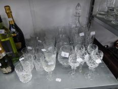 TWO SETS OF SIX CUT GLASS SPIRIT TUMBLERS; A SET OF SIX CUT GLASS STEM SHERRY GLASSES; A SET OF