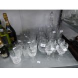 TWO SETS OF SIX CUT GLASS SPIRIT TUMBLERS; A SET OF SIX CUT GLASS STEM SHERRY GLASSES; A SET OF