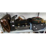 A BROWN LEATHER BRIEFCASE, A BLACK LEATHER SATCHEL, AND VARIOUS OTHER BAGS