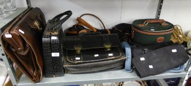 A BROWN LEATHER BRIEFCASE, A BLACK LEATHER SATCHEL, AND VARIOUS OTHER BAGS