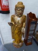 A FLOOR STANDING SOFTWOOD FIGURE OF A BUDDHA, PAINTED MAINLY IN GOLD (A.F.)