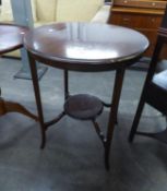 A MAHOGANY CIRCULAR TOPPED OCCASIONAL TABLE, WITH UNDER TIER, RAISED ON SLENDER SUPPORTS