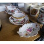 TWO 19TH CENTURY SPECIMEN TEACUPS AND SAUCERS, WITH INDIAN TREE STYLE DECORATION AND A ?DERBY