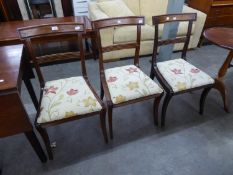 A SET OF THREE MAHOGANY SABRE LEGGED CHAIRS  (3)