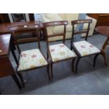 A SET OF THREE MAHOGANY SABRE LEGGED CHAIRS  (3)