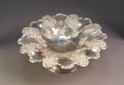 GEORGE V PRESENTATION EMBOSSED AND PIERCED SILVER PEDESTAL CAKE STAND, the petal shaped rim