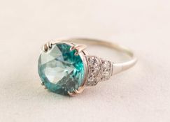 18ct WHITE GOLD ART DECO RING WITH A LARGE AND LIVELY SEA BLUE ZIRCON, in a four claw setting,