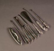 FIVE PIECE SILVER CLAD NAIL MANICURE SET, including buffer, together with TWO BUTTON HOOKS WITH FAN