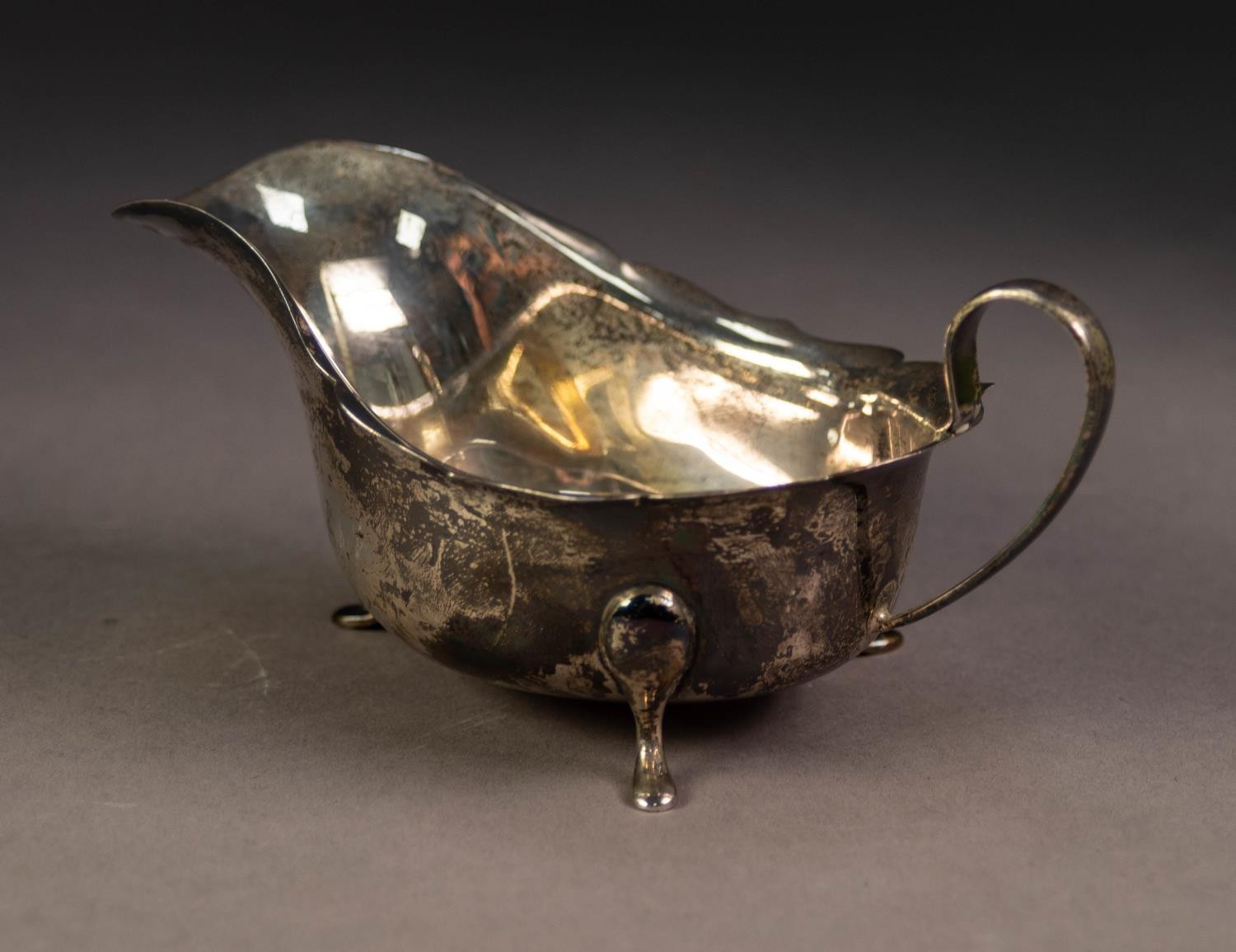 GEORGE V SILVER SAUCE BOAT, with cyma border, high scroll handle and pad feet, 6? (15.2cm) long, - Image 3 of 3