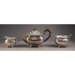 GEORGIAN STYLE SILVER TEA SET OF 3 PIECES, of rounded oblong form with serpentine outline moulded