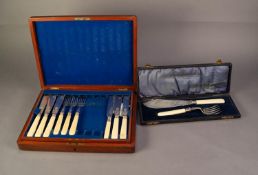 EDWARDIAN MAHOGANY CASED INCOMPLETE SET OF ELEVEN PLATED FISH KNIVES AND NINE FORKS, with bone