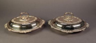 PAIR OF LATE VICTORIAN ELECTROPLATED OVAL ENTREE DISHES with removable handles and reversible