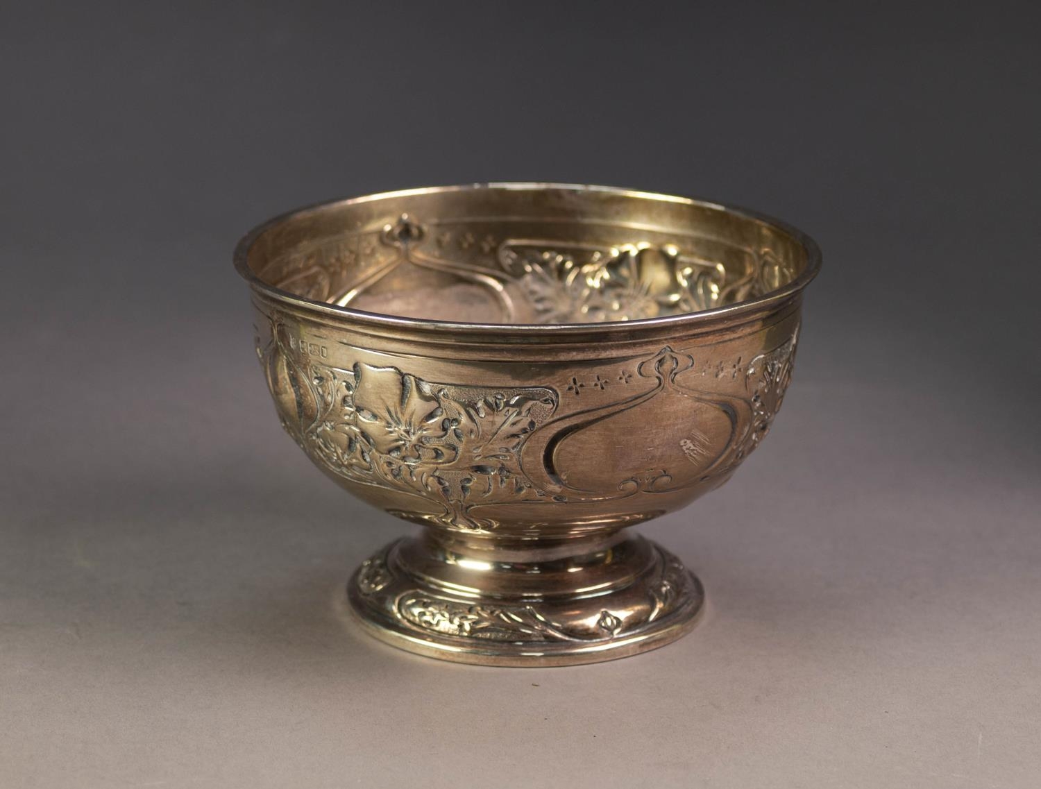 EDWARD VII ART NOUVEAU SILVER PEDESTAL ROSE BOWL, repousse with foliate scroll panels and vacant