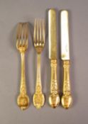 CHRISTOFLE A PARIS, EARLY 20th CENTURY 24 CARAT GOLD PLATED TABLE SERVICE, 11 knives and 12 forks,