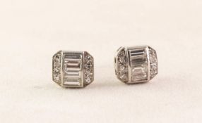 PAIR OF ART DECO DIAMOND STUD EARRINGS, oblong with canted corners, each with a raised centre