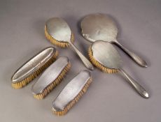 LADY?S ENGINE TURNED SILVER BACKED FIVE PIECE DRESSING TABLE HAND MIRROR AND BRUSH SET,