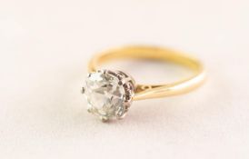 18ct GOLD RING SET WITH AN OLD CUT SOLITAIRE DIAMOND, cushion shaped in an eight claw crown setting,