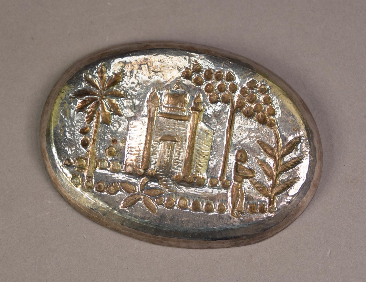 ASIAN EMBOSSED SILVER COLOURED METAL OVAL, SHALLOW DISH, decorated with a temple, figure and palm - Image 2 of 2