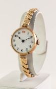 LADY'S 9ct GOLD CASED VINTAGE WRISTWATCH with 15 jewels Swiss movement, white porcelain arabic dial,