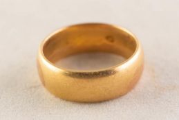 GOLD COLOURED METAL BROAD WEDDING RING, 6.7gms, ring size K, (tests as high carat gold)