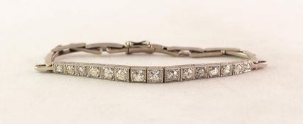 LATE VICTORIAN WHITE GOLD AND DIAMOND FLEXIBLE BRACELET, having fifteen round, old cut diamonds