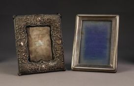 LATE VICTORIAN/EDWARDIAN FLORID STAMPED SILVER FACED PHOTOGRAPH FRAME with purple velvet covered