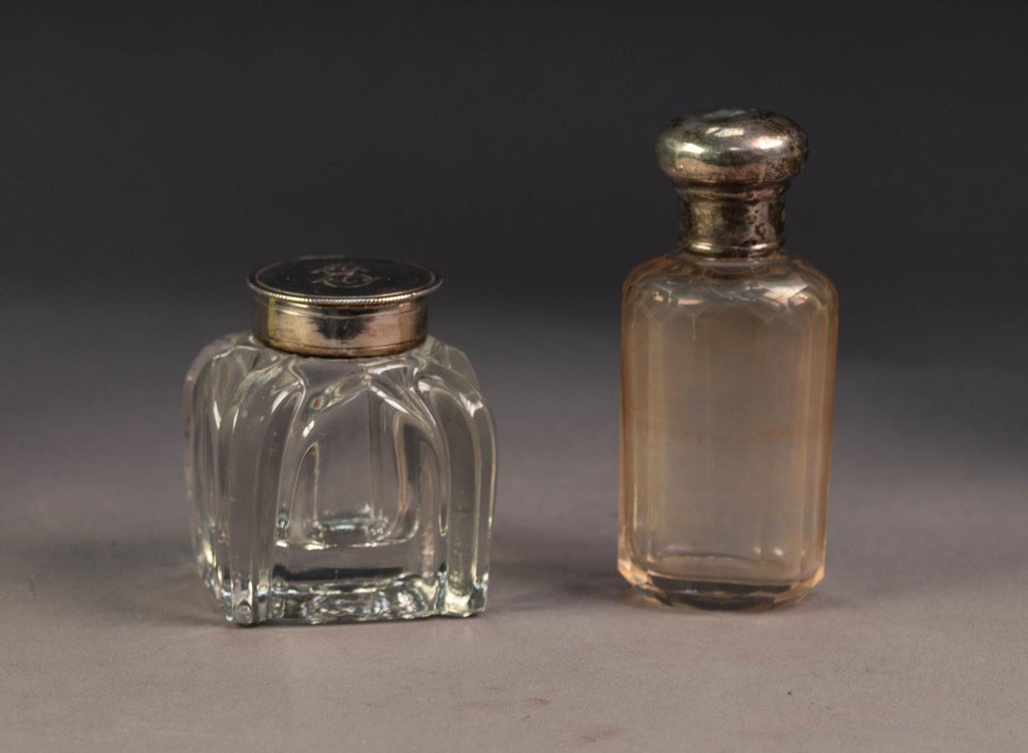SQUARE MOULDED GLASS INKWELL WITH UNMARKED SILVER COLLAR AND LIDDED COVER, initialled, 2 ½? (6.
