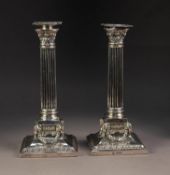 PAIR OF LATE VICTORIAN WEIGHTED SILVER CORINTHIAN COLUMN CANDLESTICKS, the slightly tapering