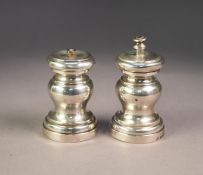 PAIR OF EDWARDIAN SILVER BALUSTER PEPPER MILLS, 3/4in high, makers Mappin & Webb, Birmingham 1909,