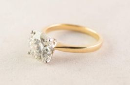 18ct GOLD RING WITH A ROUND BRILLIANT CUT SOLITAIRE DIAMOND, in a white gold four claw setting, 3.