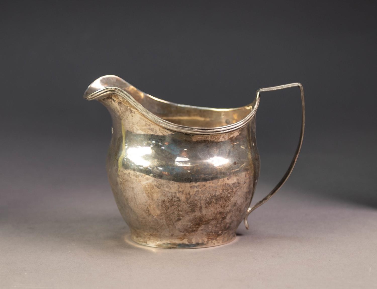 GEORGE III SILVER CREAM JUG BY JOHN MEWBURN, of oval, bellied form with reeded border and angular - Image 2 of 3