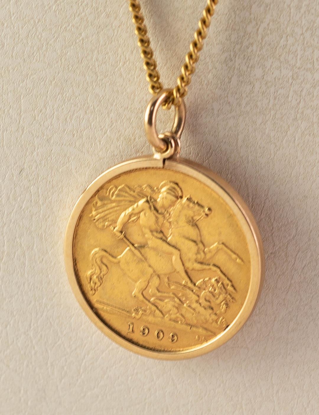 EDWARD VII 1909 GOLD HALF SOVEREIGN, loose framed as a pendant and the 9ct GOLD FINE CHAIN NECKLACE, - Image 2 of 3