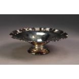 MODERN SILVER PEDESTAL SWEETMEAT DISH, with shaped and moulded border and circular foot, 1 ¾? (4.