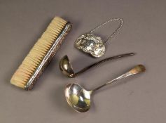 VICTORIAN FLORAL EMBOSSED SILVER BACKED HAT BRUSH, London 1882, together with a ?CARTIER?