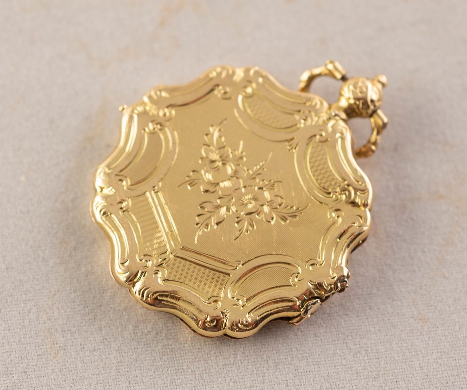 VICTORIAN FLORAL ENGRAVED AND ENGINE TURNED GOLD COLOURED METAL SHAPED CIRCULAR PENDANT, with rococo - Image 2 of 2